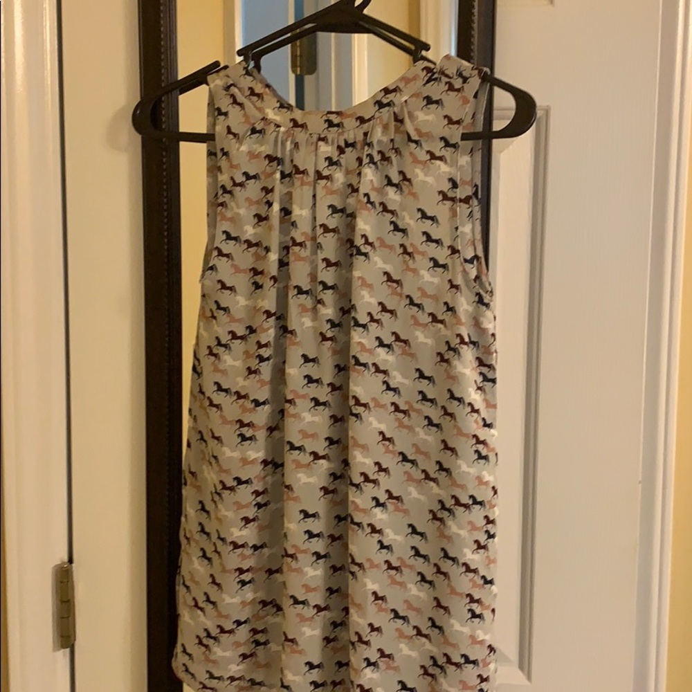 Horse print 100% polyester blouse.